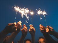 Image of people holding sparklers