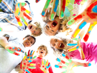 Image of a group of child with paint on their hands